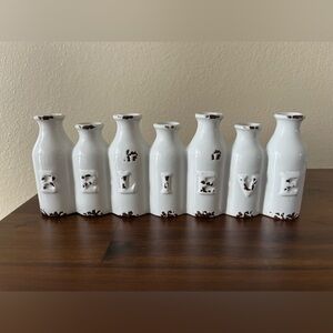 Ceramic “Believe” Seven Bottle Bud Vase